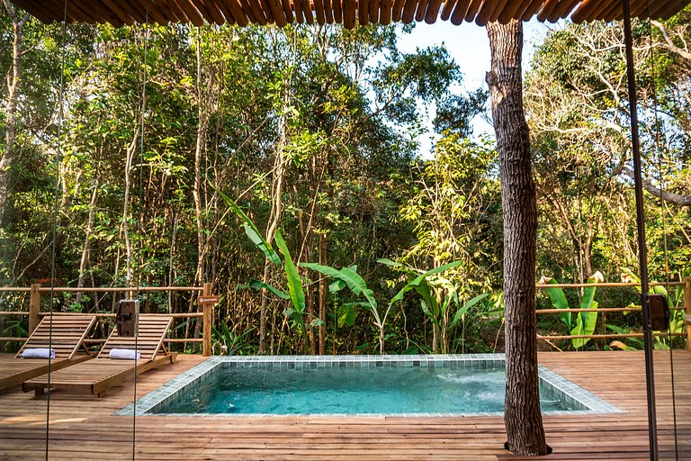 Casa Caqui Trancoso - Cravejada em reserva natural