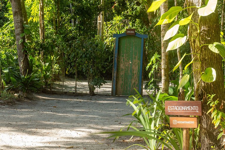 Casa Caqui Trancoso - Cravejada em reserva natural